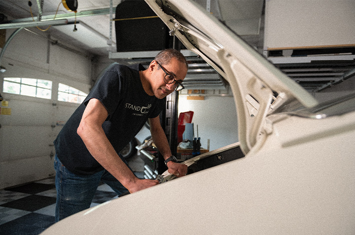 Ravi Menon: A passion for taking things apart, working on his car in a garage